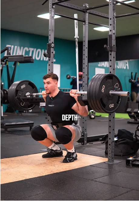 Lifter at the bottom of a back squat